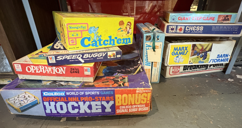 Vintage board game collection featuring classics like Operation, Catch’em, Speed Buggy, Coleco NHL Pro-Stars Hockey, and more, perfect for retro game enthusiasts and collector